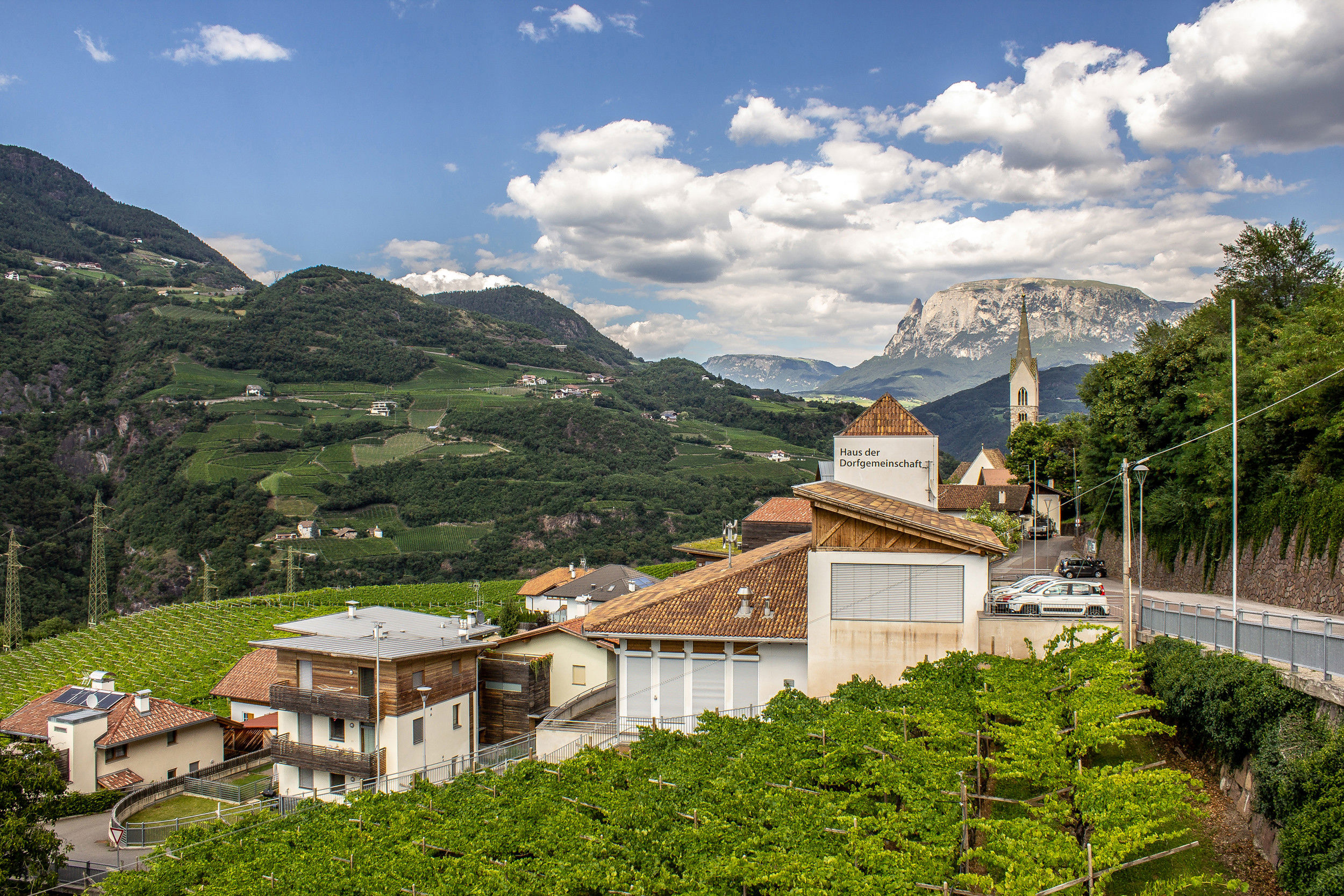 View of Karneid with church and Mt. Schlern in the background