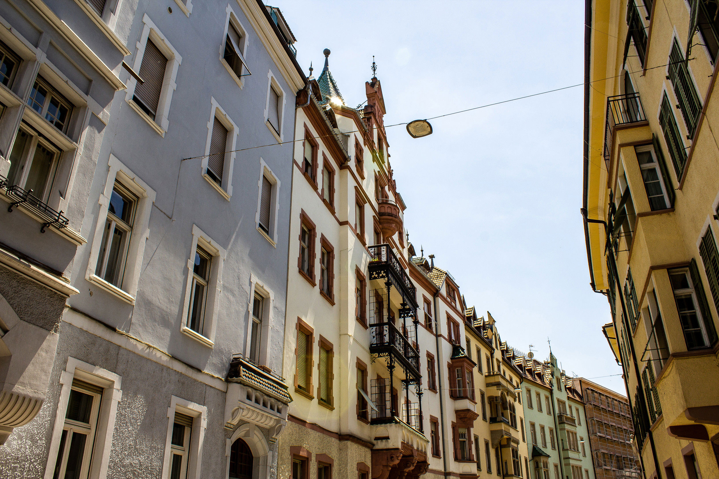 View of the houses in the narrow streets of the old town of Bozen.