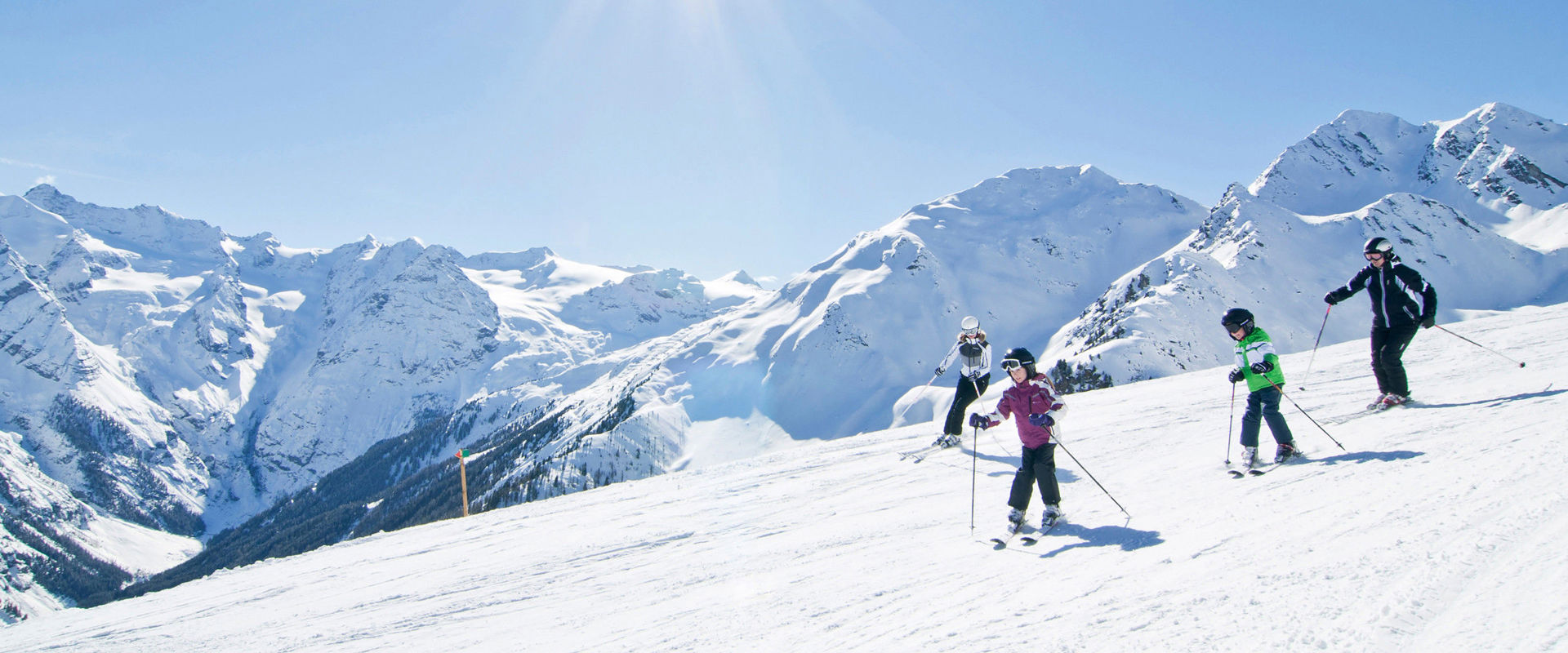 Ortler Skiarena 4 skiers on the descent.
