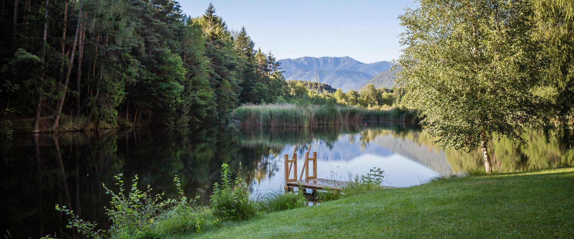 Lake Vahrn Idyllic lake with a jetty in the middle of unspoilt nature.