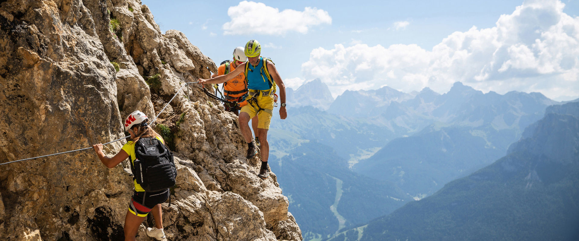 Masaré via ferrata A small group climbs the Masaré via ferrata.