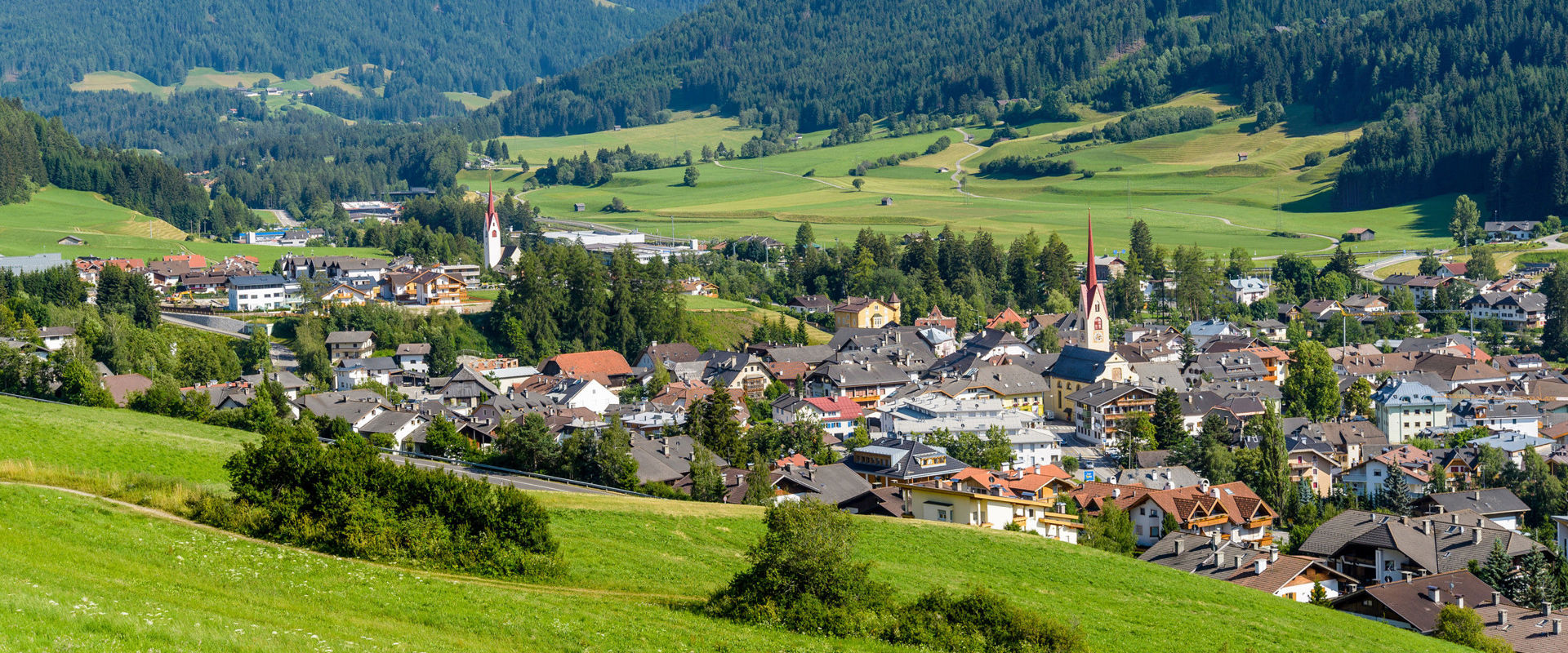 Welsberg-Taisten View of Welsberg with the Dolomites in the background