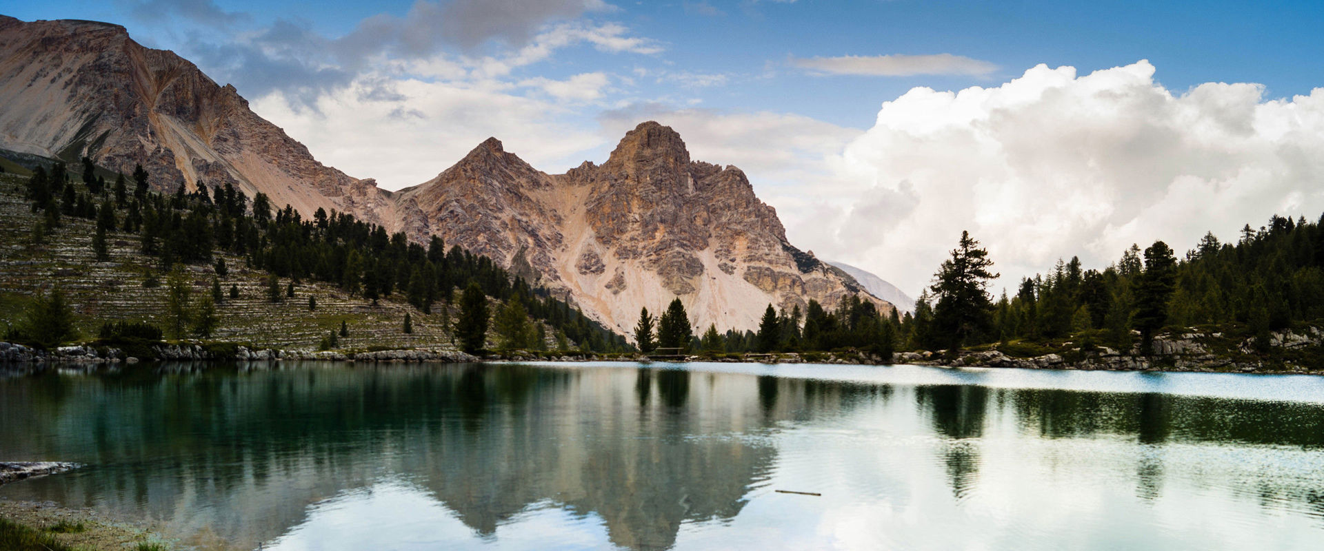 Lake Grünsee Fanes Clear mountain lake with reflection and Dolomites peak