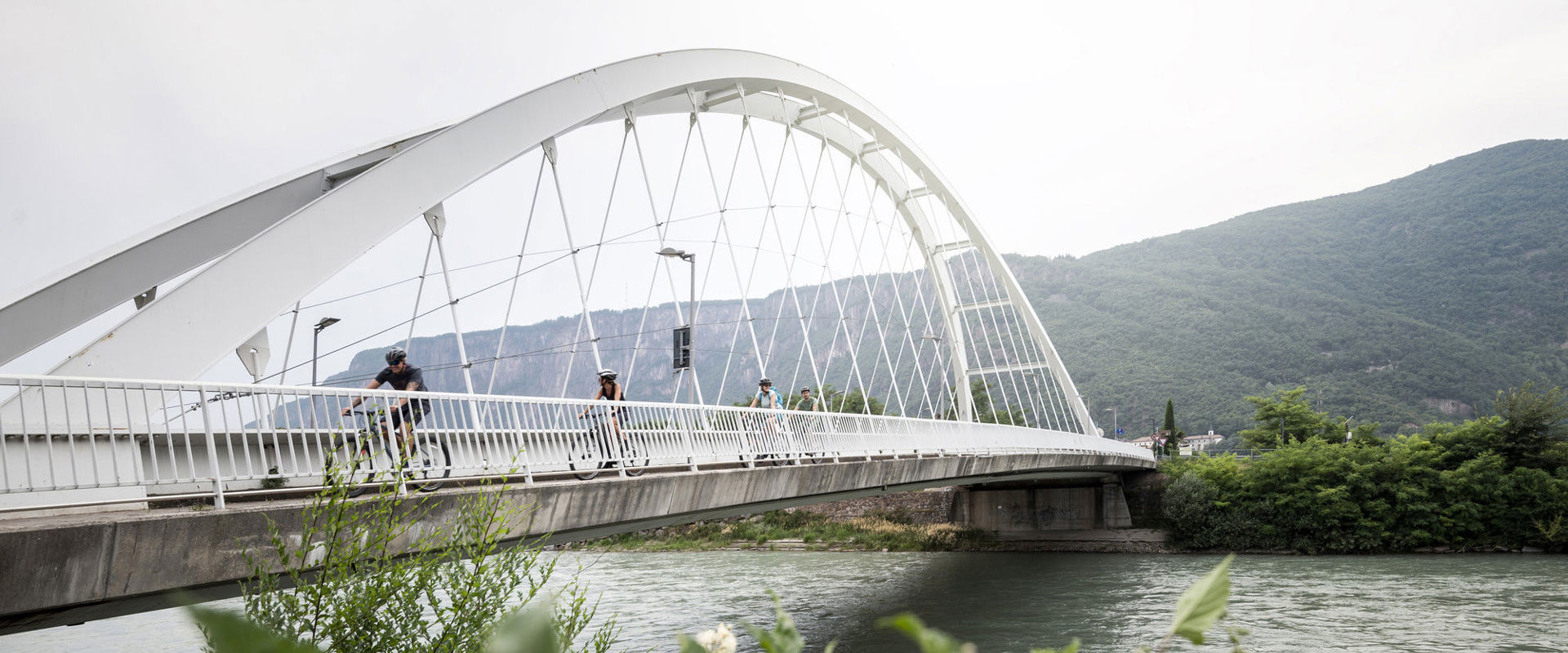 Cycling White bridge with cyclists